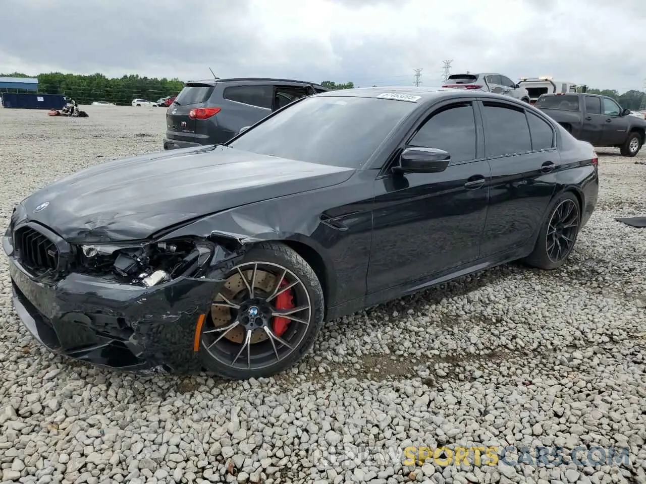 1 Photograph of a damaged car WBS83CH06NCJ03339 BMW M5 2022