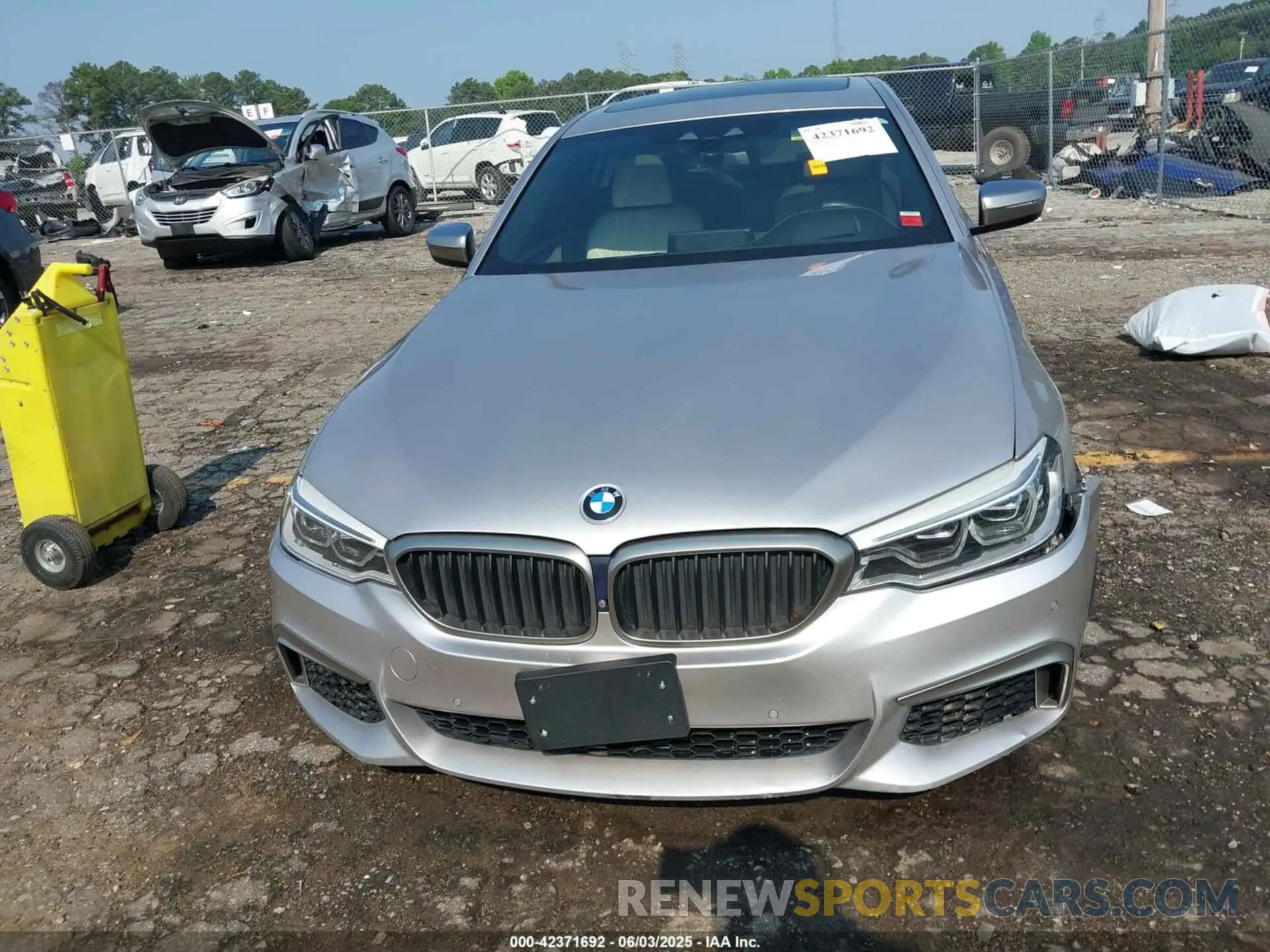 12 Photograph of a damaged car WBAJS7C00LCD98929 BMW M550I 2020