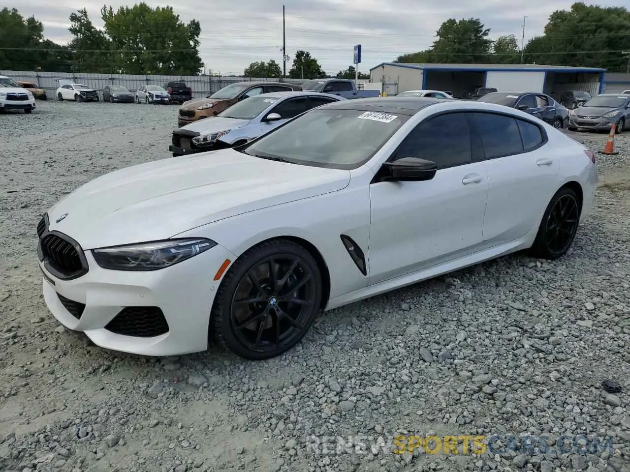 1 Photograph of a damaged car WBAGV8C02LCE26317 BMW M8 2020