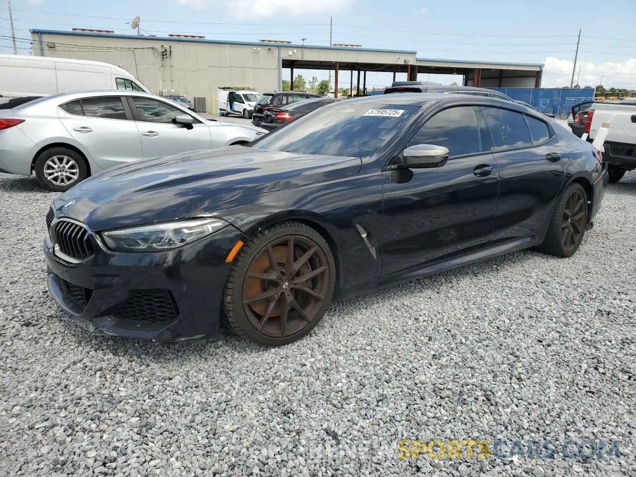 1 Photograph of a damaged car WBAGV8C06LBP48901 BMW M8 2020