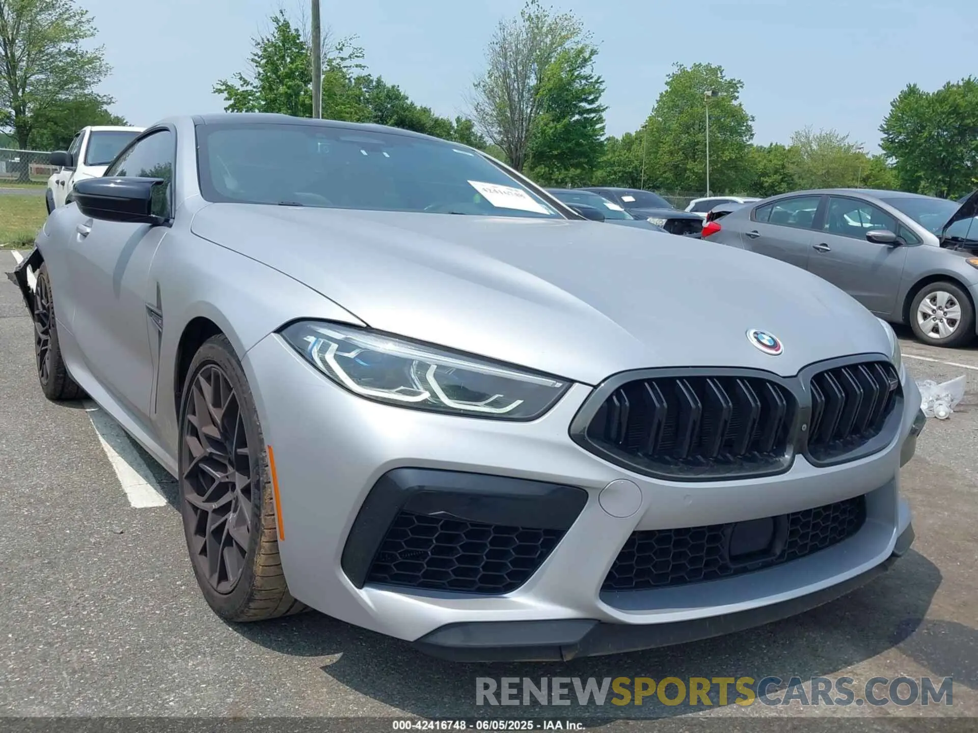 1 Photograph of a damaged car WBSAE0C00LBM08498 BMW M8 2020