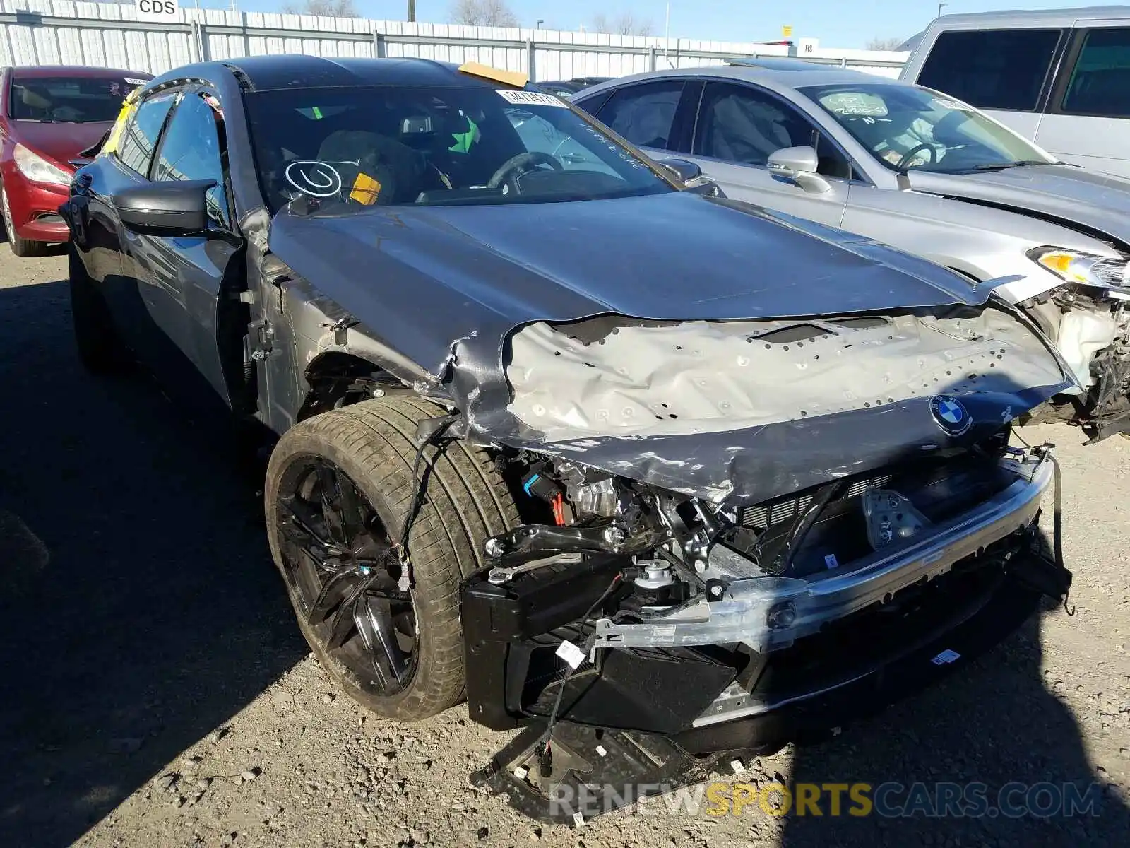 1 Photograph of a damaged car WBSGV0C09MCF18913 BMW M8 2021