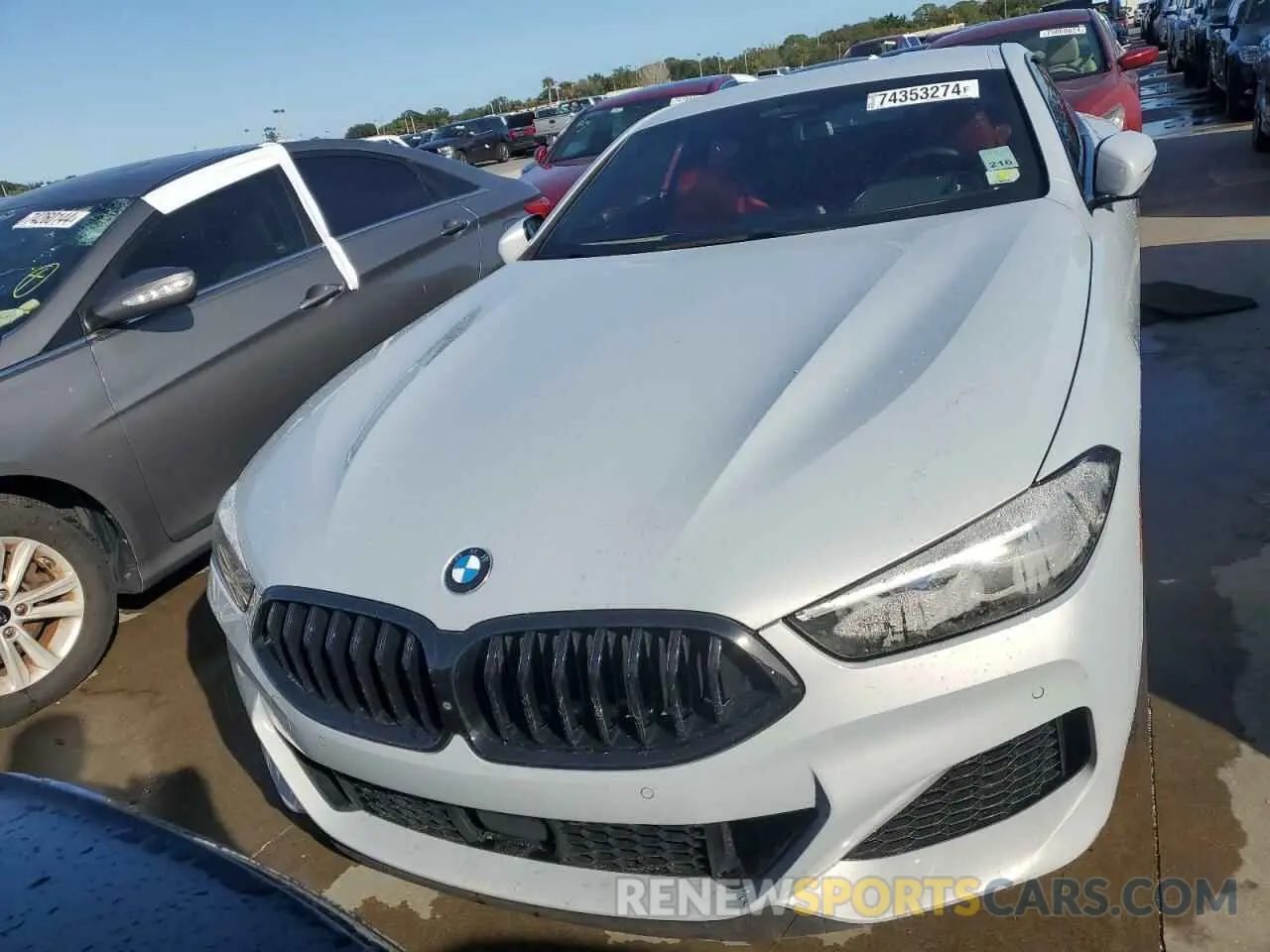 5 Photograph of a damaged car WBABC4C01NCH15281 BMW M8 2022