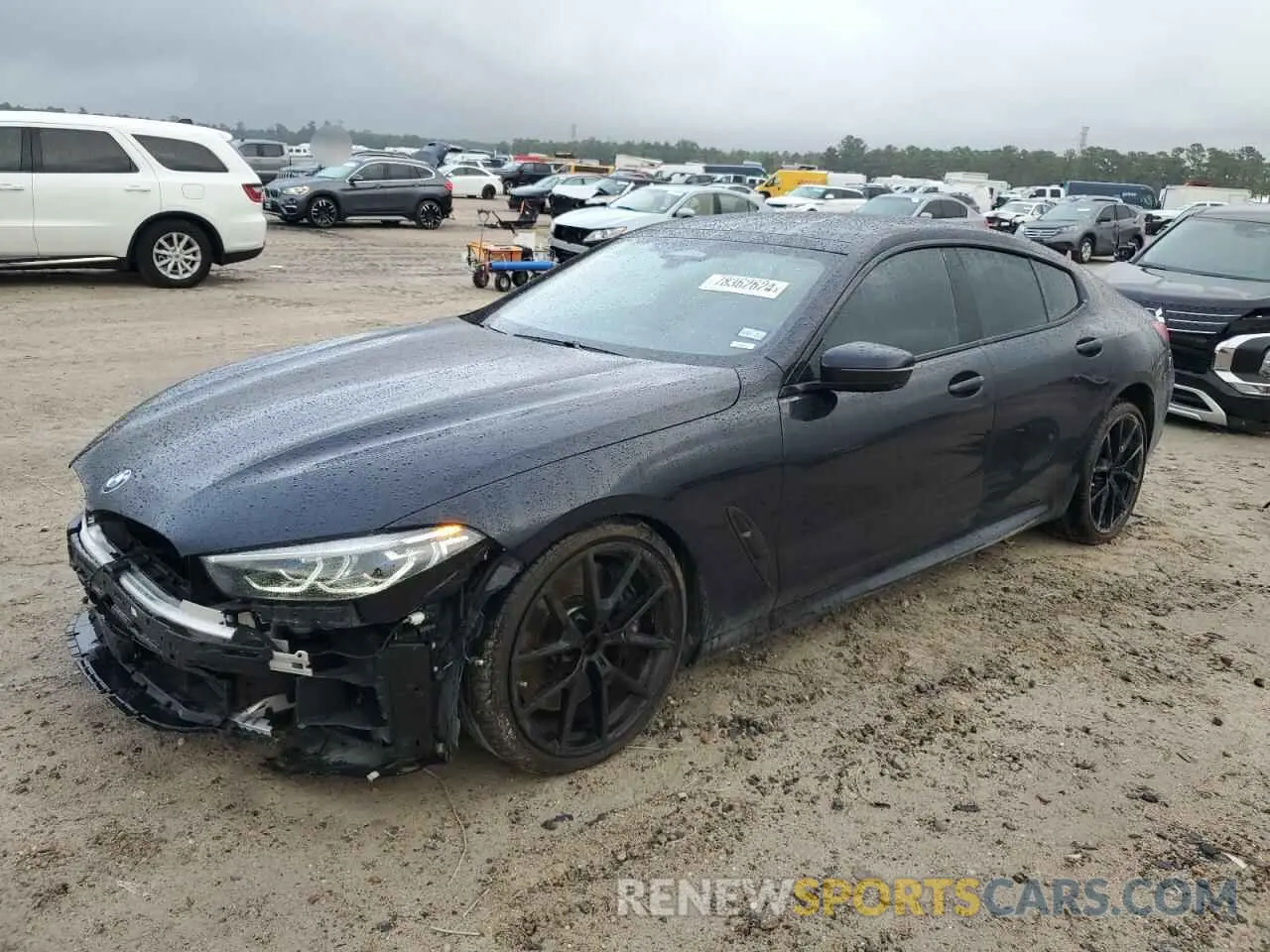 1 Photograph of a damaged car WBAGV8C02NCH18326 BMW M8 2022