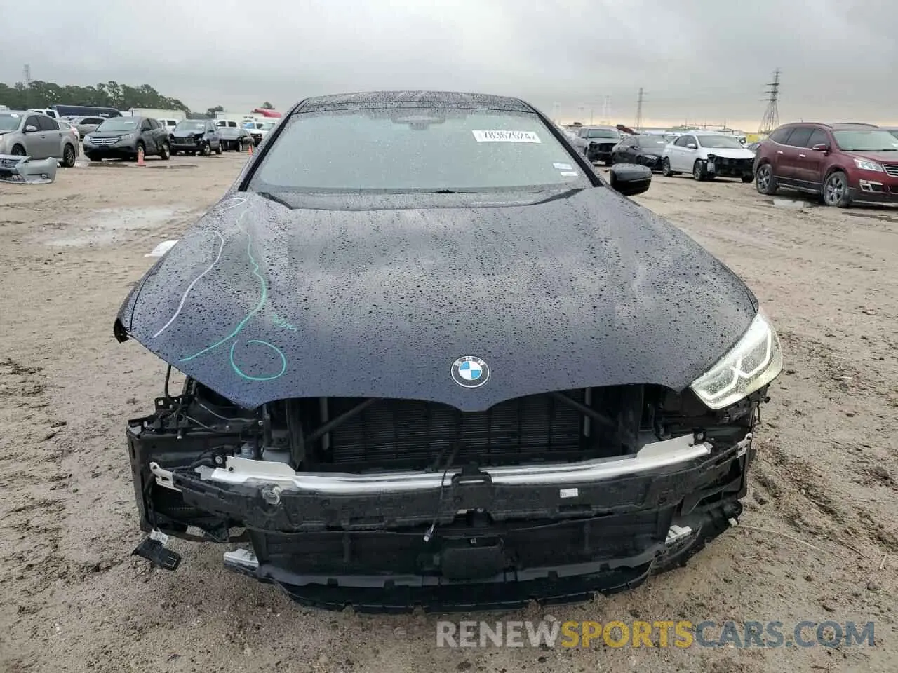 5 Photograph of a damaged car WBAGV8C02NCH18326 BMW M8 2022