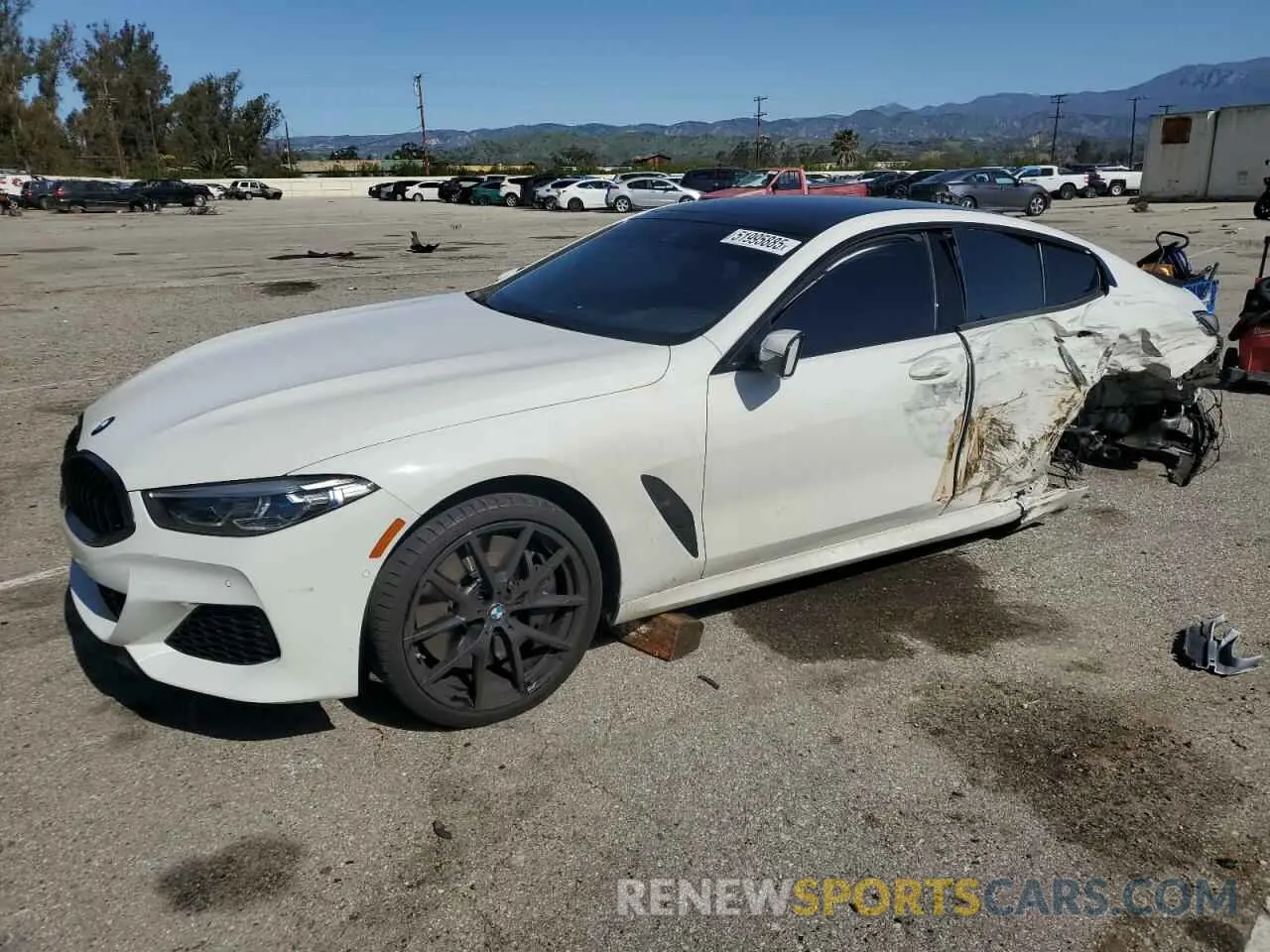 1 Photograph of a damaged car WBAGV8C08NCH67191 BMW M8 2022
