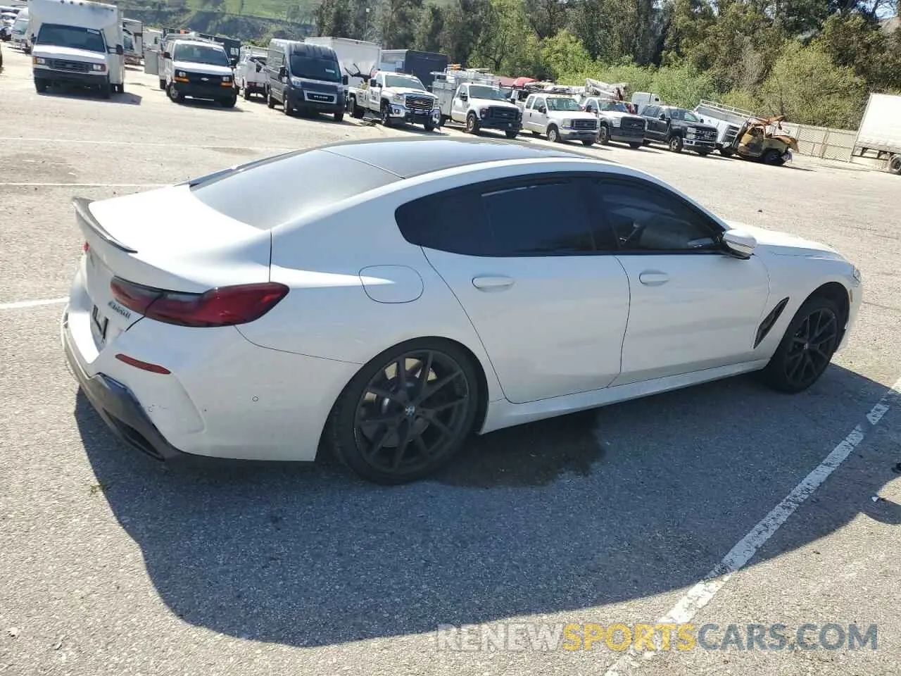 3 Photograph of a damaged car WBAGV8C08NCH67191 BMW M8 2022