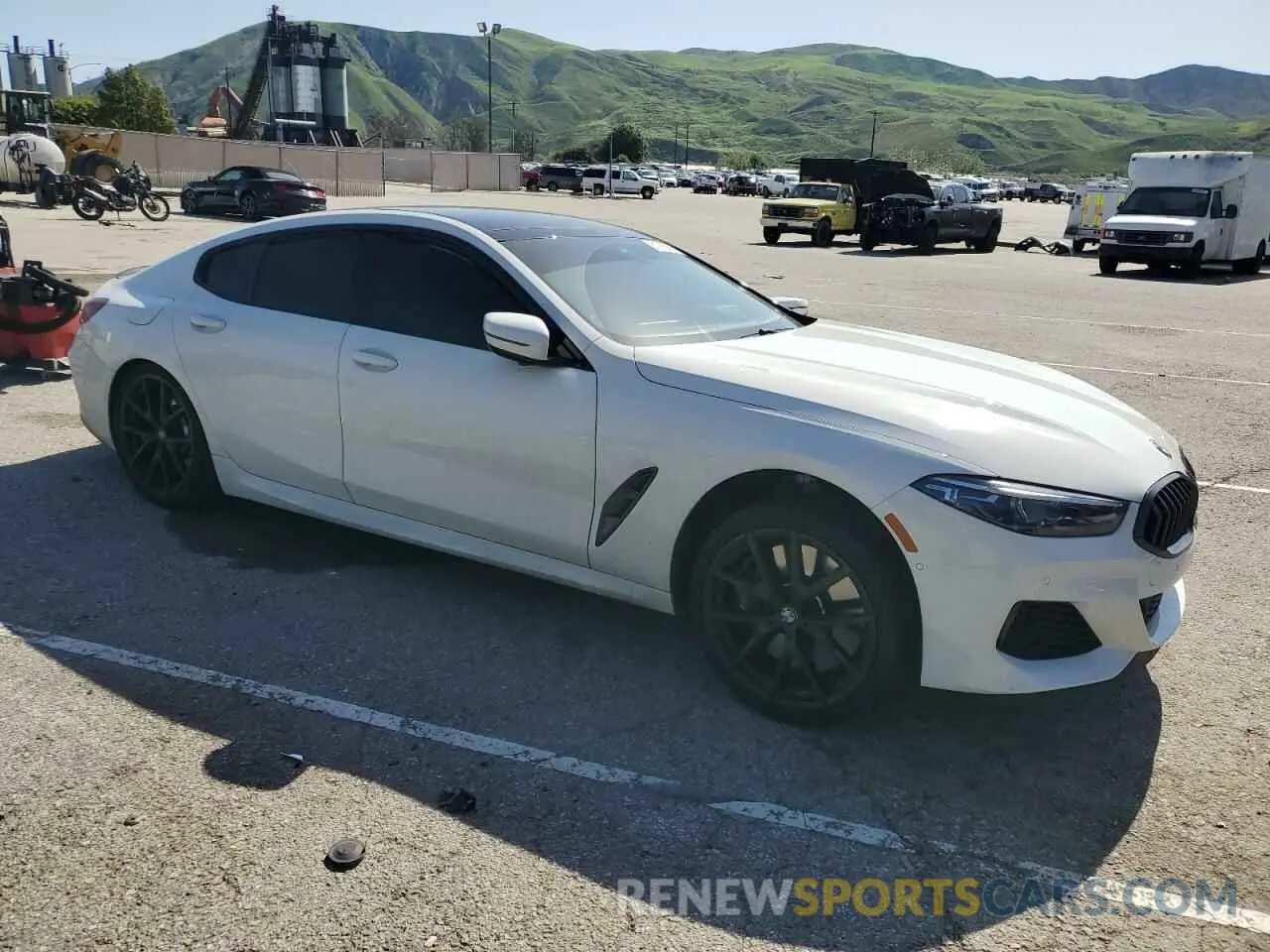 4 Photograph of a damaged car WBAGV8C08NCH67191 BMW M8 2022
