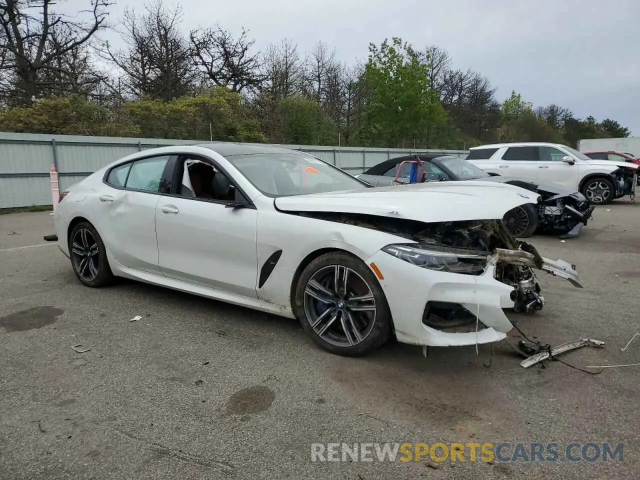 4 Photograph of a damaged car WBAGV8C08NCJ78641 BMW M8 2022