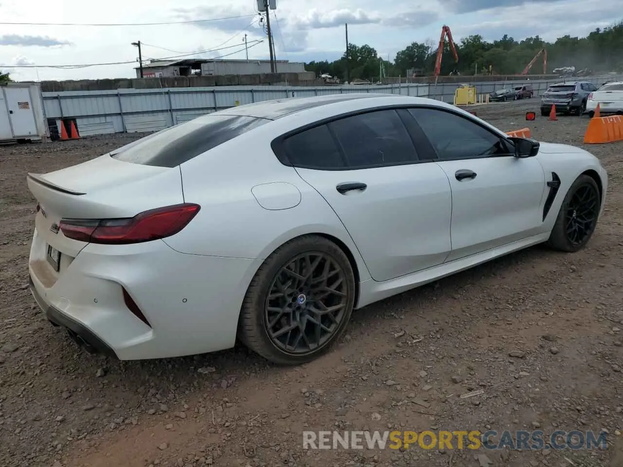 3 Photograph of a damaged car WBSGV0C02NCG77628 BMW M8 2022