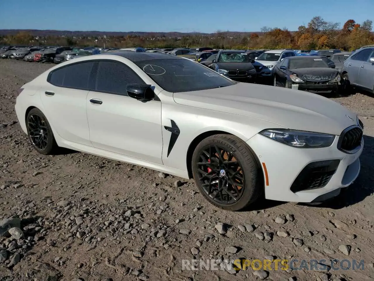 4 Photograph of a damaged car WBSGV0C02NCG77628 BMW M8 2022