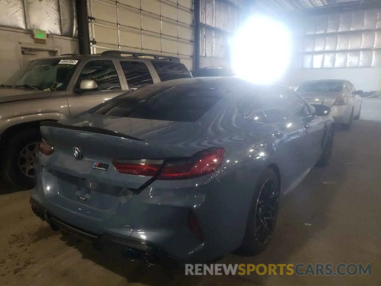 4 Photograph of a damaged car WBSGV0C02NCH51310 BMW M8 2022
