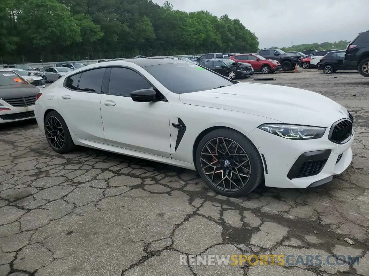 4 Photograph of a damaged car WBSGV0C07NCJ81642 BMW M8 2022