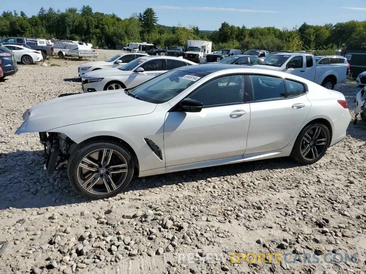 1 Photograph of a damaged car WBAGV8C01PCM79724 BMW M8 2023