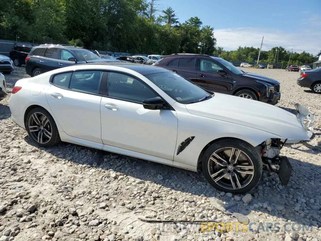 4 Photograph of a damaged car WBAGV8C01PCM79724 BMW M8 2023