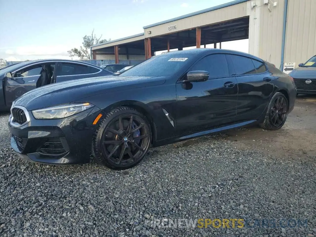 1 Photograph of a damaged car WBAGV8C02PCK67527 BMW M8 2023