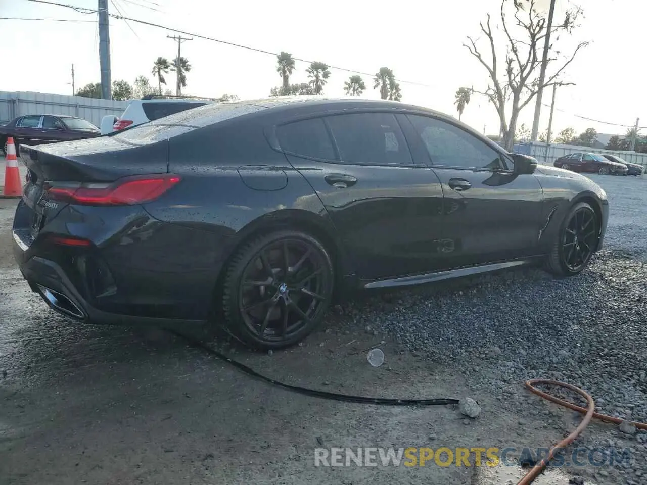 3 Photograph of a damaged car WBAGV8C02PCK67527 BMW M8 2023