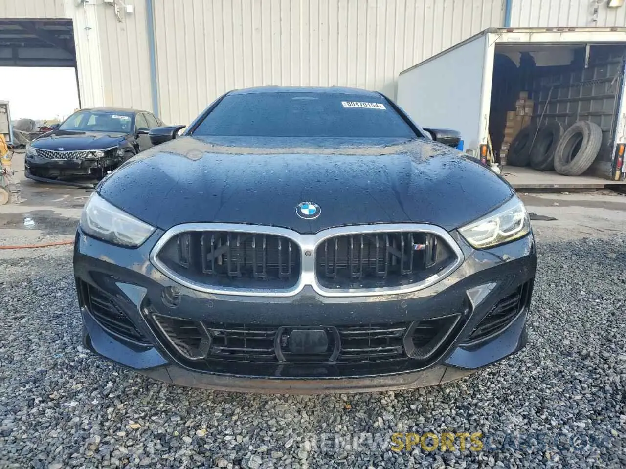 5 Photograph of a damaged car WBAGV8C02PCK67527 BMW M8 2023