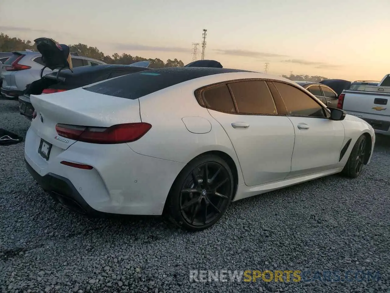 3 Photograph of a damaged car WBAGV8C0XPCL58173 BMW M8 2023