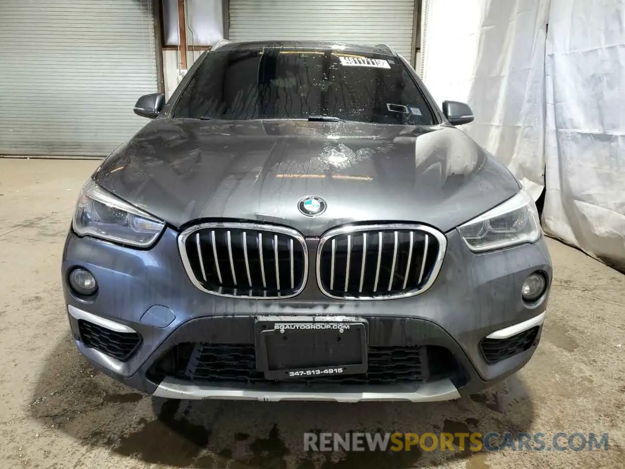 5 Photograph of a damaged car WBXHT3C52K5L89624 BMW X1 2019