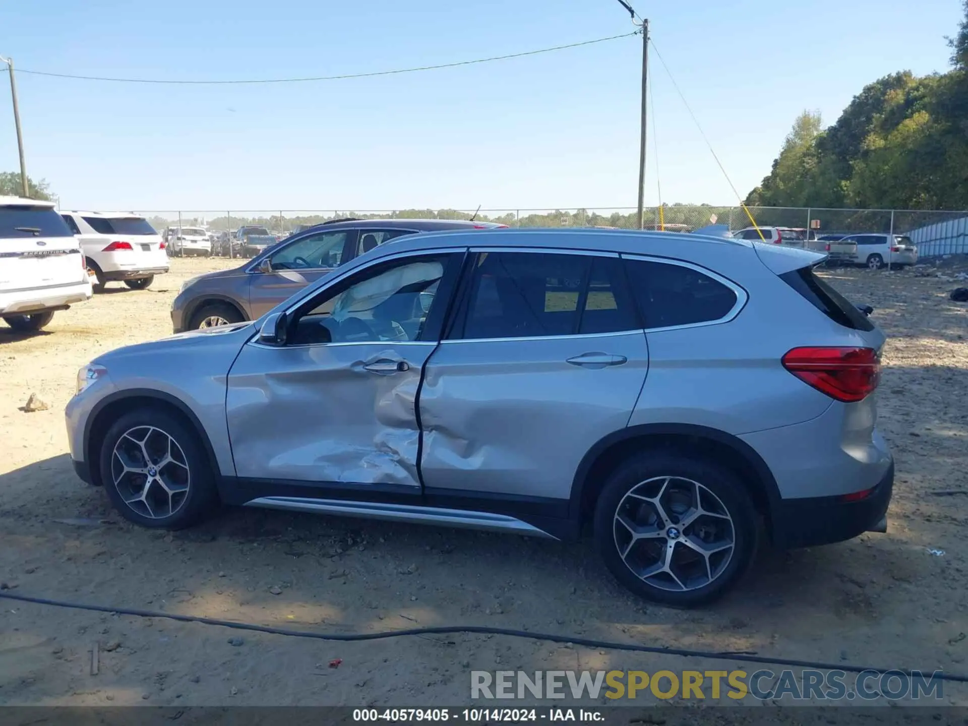 14 Photograph of a damaged car WBXHT3C53K5L37192 BMW X1 2019