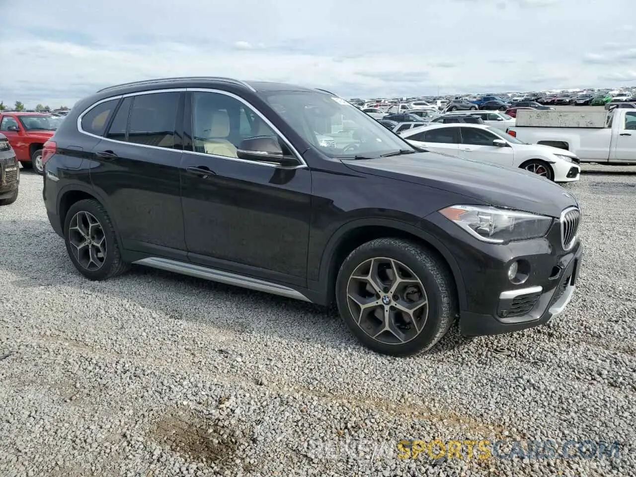 4 Photograph of a damaged car WBXHT3C53K5N27090 BMW X1 2019
