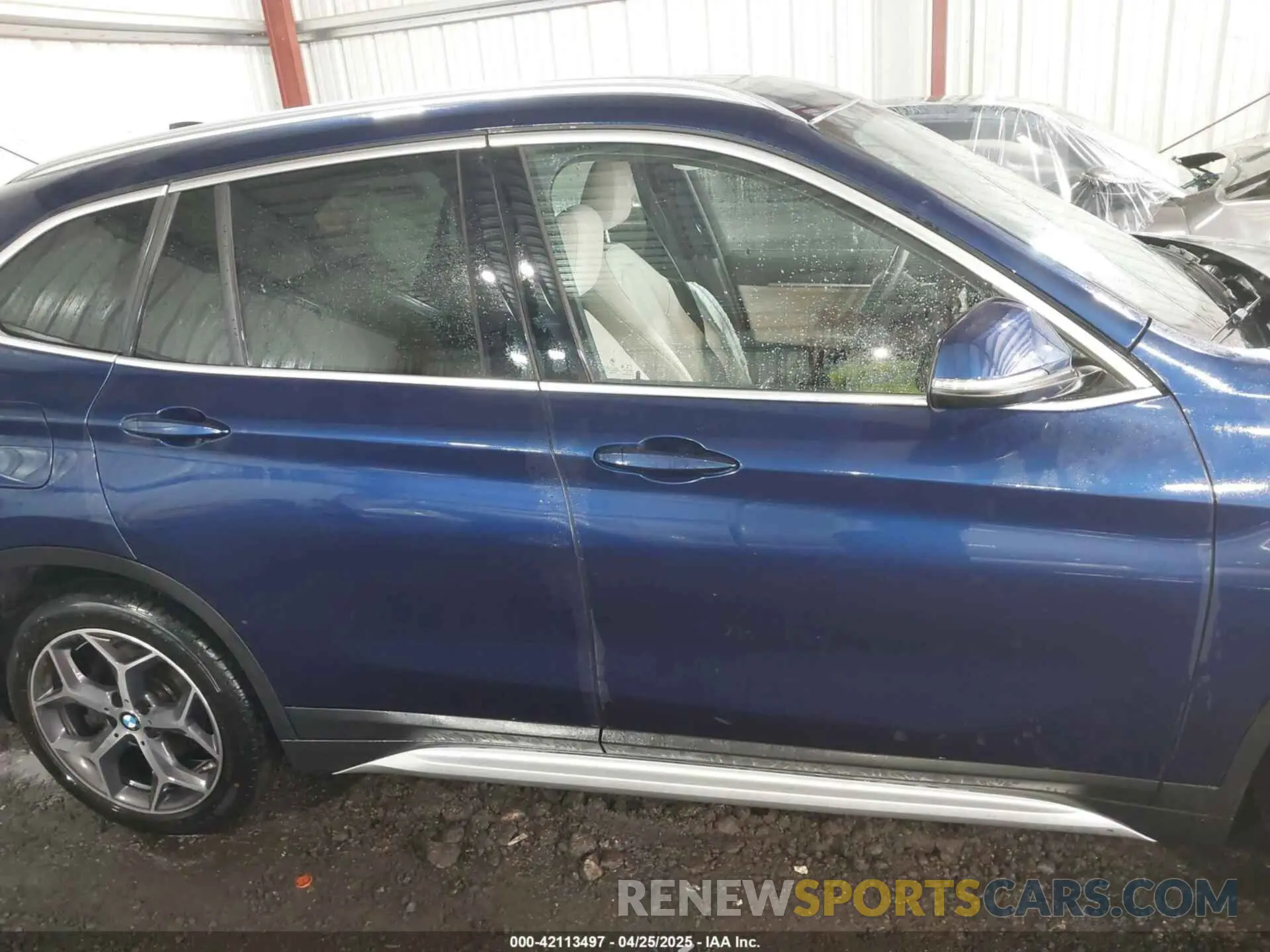 13 Photograph of a damaged car WBXHT3C56K3H34720 BMW X1 2019