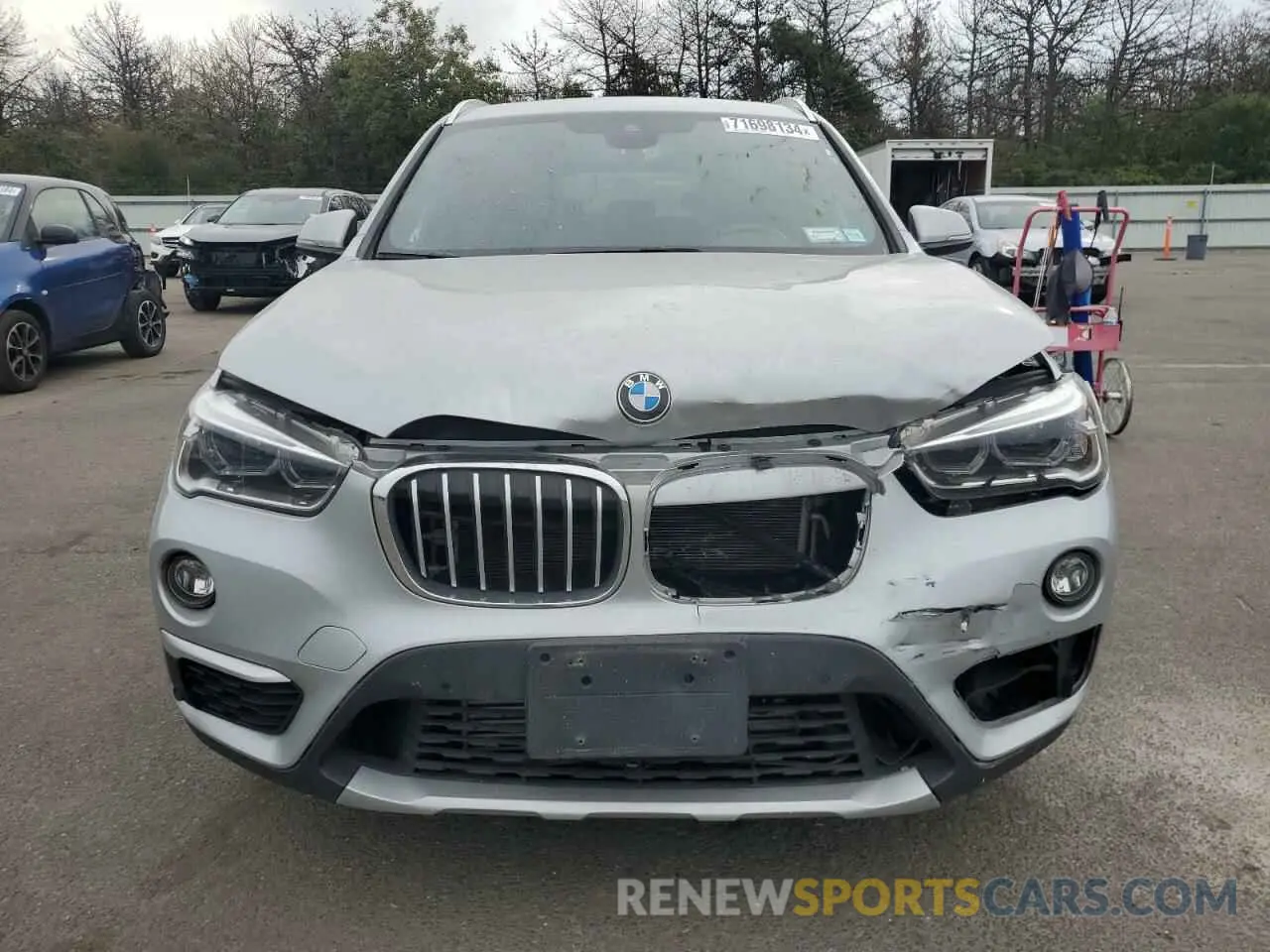 5 Photograph of a damaged car WBXHT3C57K5L36997 BMW X1 2019