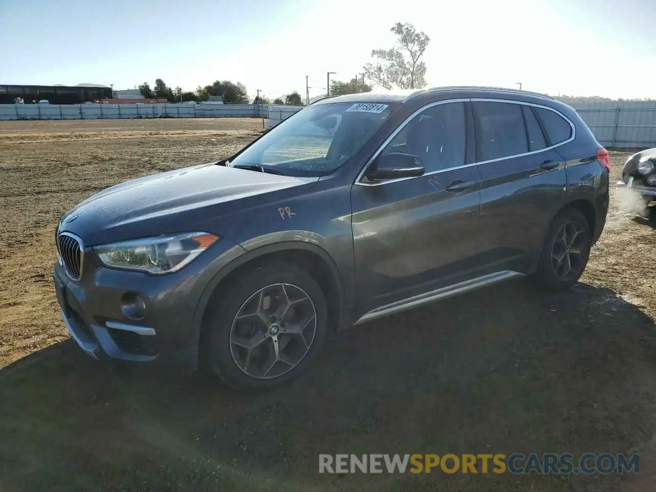 1 Photograph of a damaged car WBXHT3C58K3H33908 BMW X1 2019