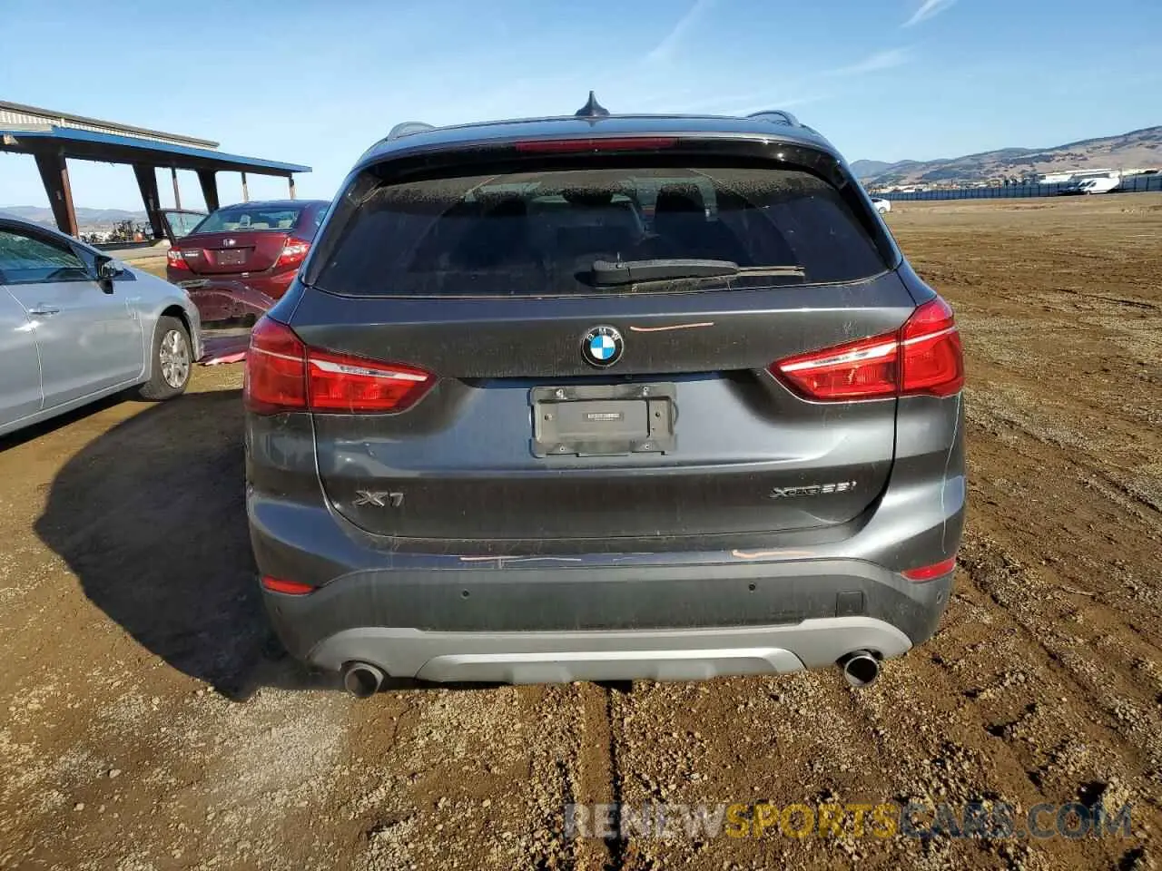 6 Photograph of a damaged car WBXHT3C58K3H33908 BMW X1 2019