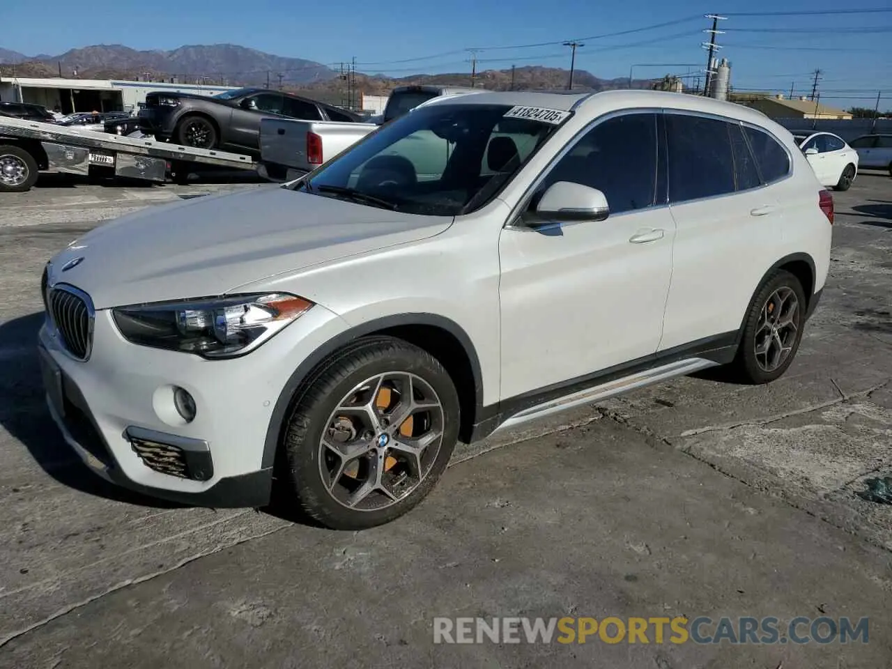 1 Photograph of a damaged car WBXHT3C58K5L36880 BMW X1 2019