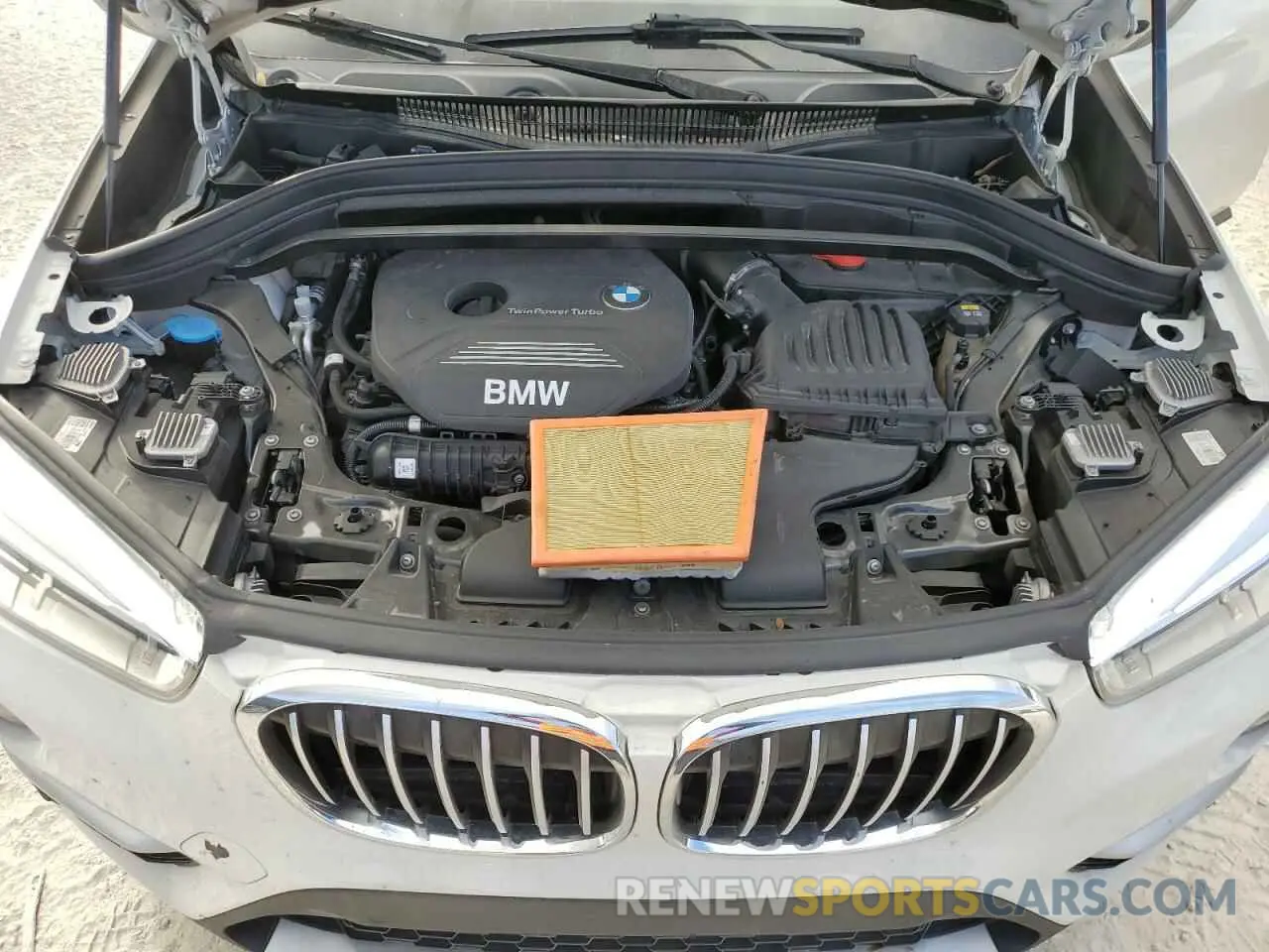 12 Photograph of a damaged car WBXHU7C51K5N13094 BMW X1 2019