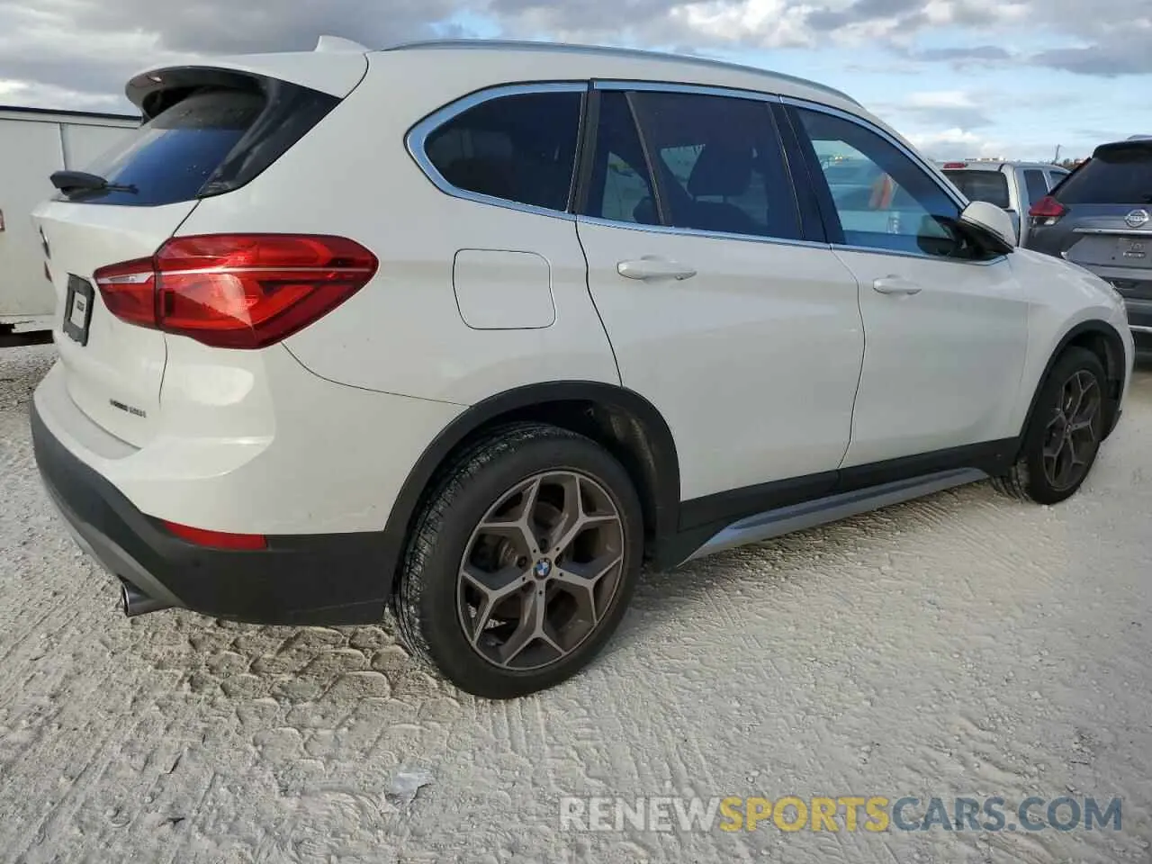3 Photograph of a damaged car WBXHU7C51K5N13094 BMW X1 2019