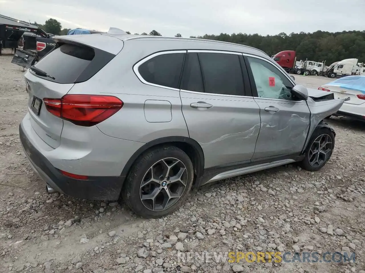 3 Photograph of a damaged car WBXHU7C53K3H45355 BMW X1 2019