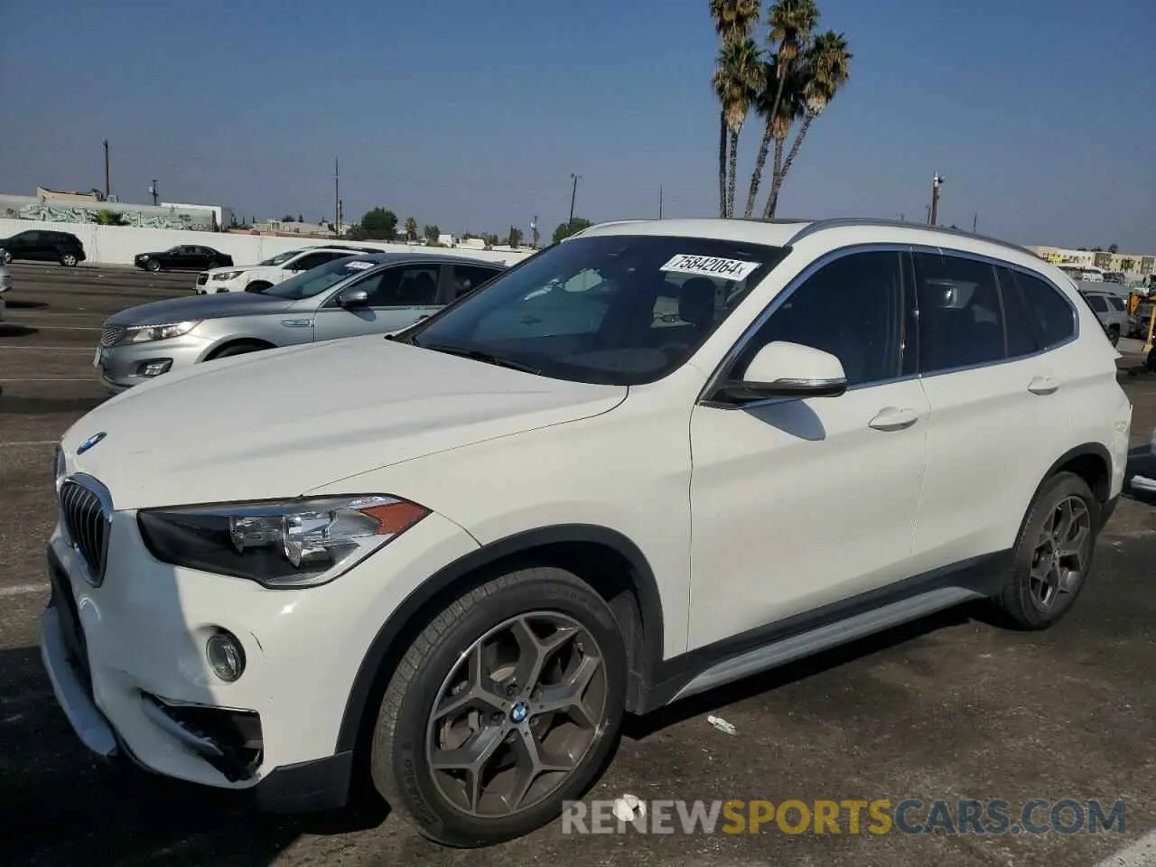 1 Photograph of a damaged car WBXHU7C53K3H45906 BMW X1 2019