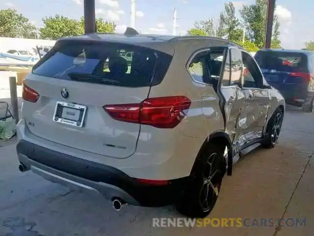 4 Photograph of a damaged car WBXHU7C54K5L10670 BMW X1 2019