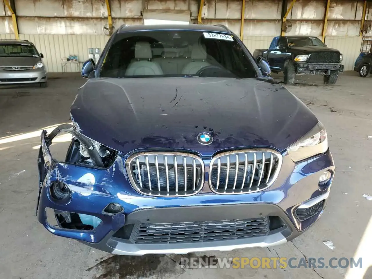 5 Photograph of a damaged car WBXHU7C57K3H46055 BMW X1 2019