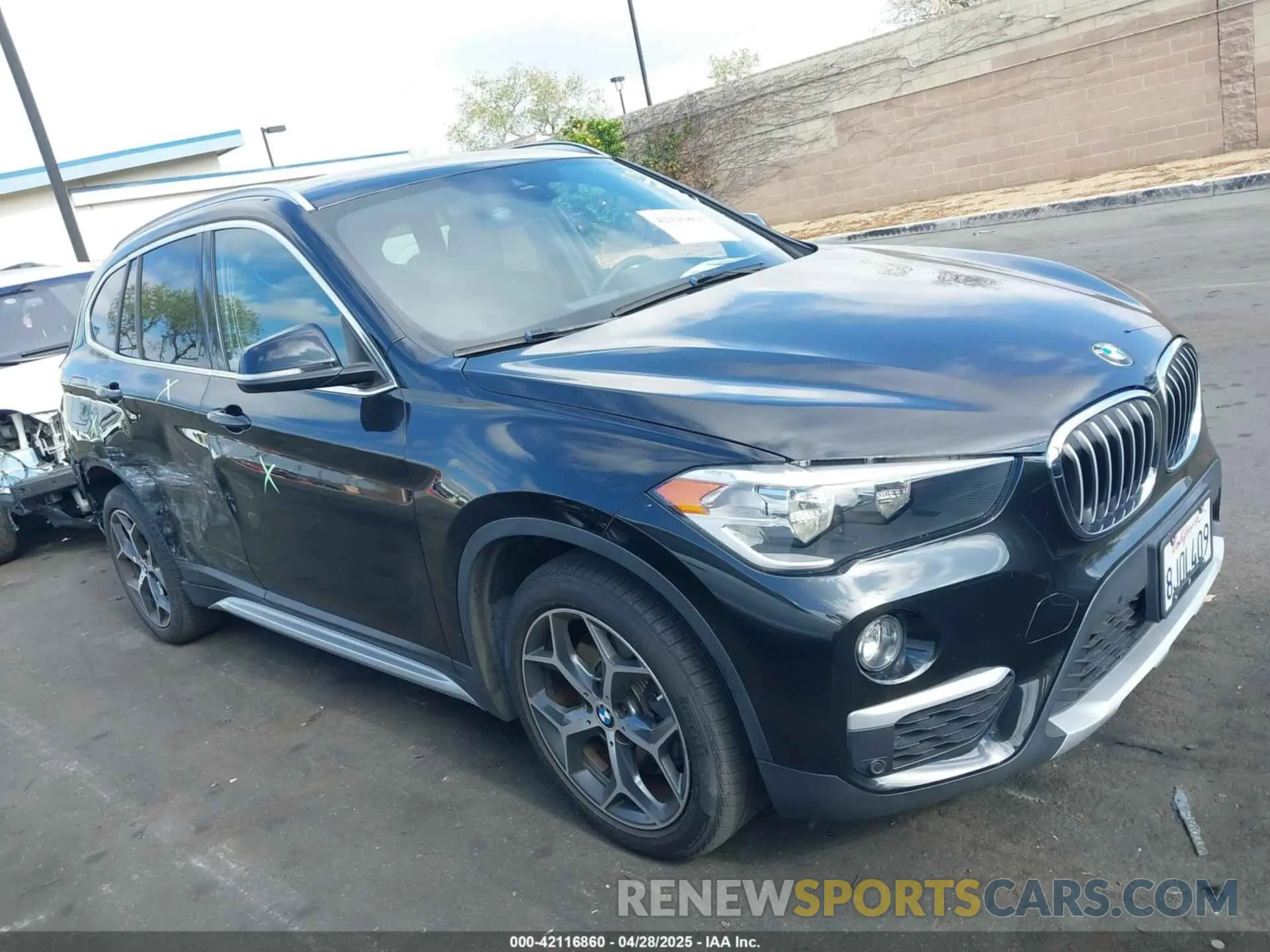 14 Photograph of a damaged car WBXHU7C59K5L12320 BMW X1 2019