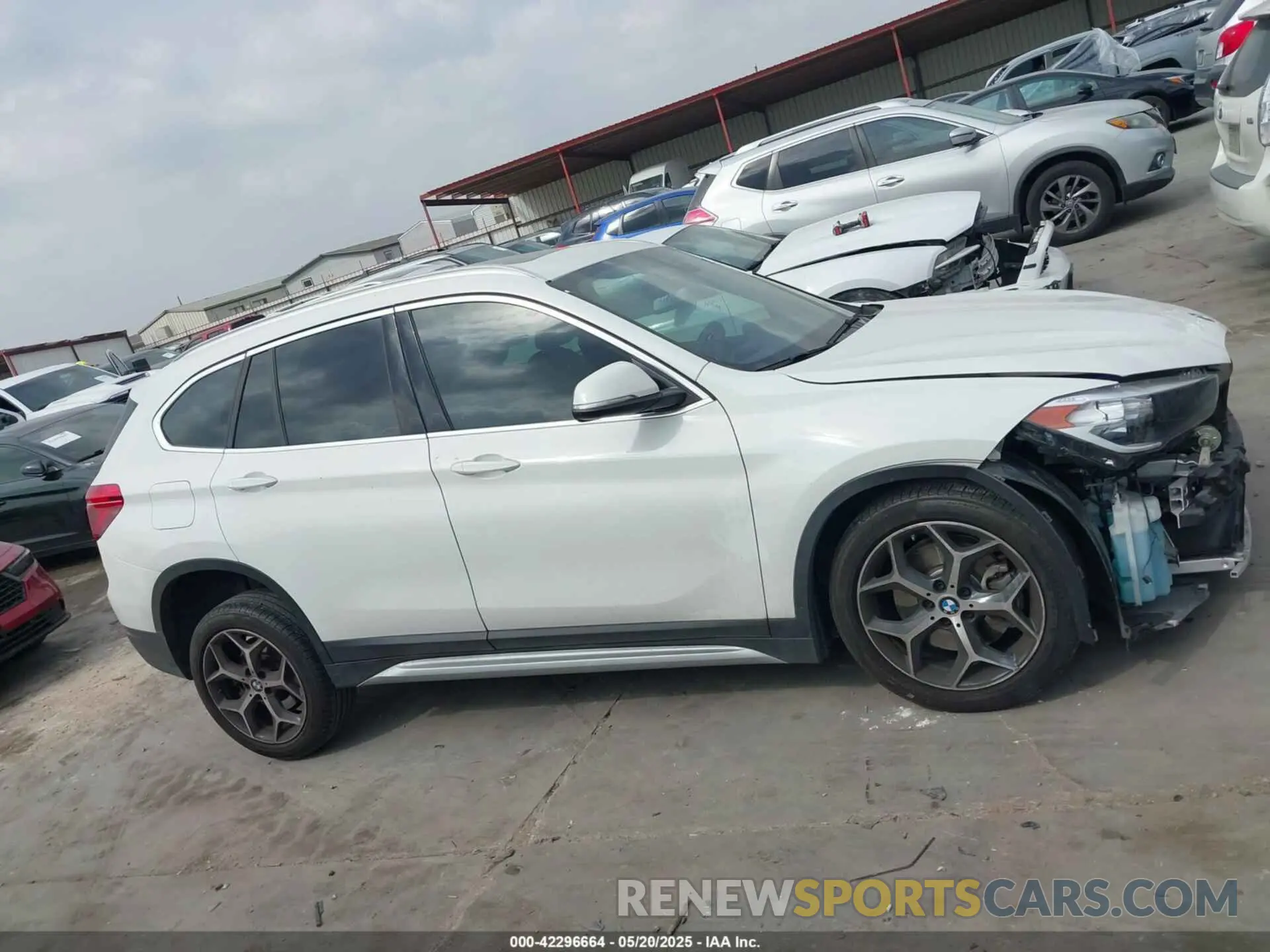 14 Photograph of a damaged car WBXHU7C5XK3H45207 BMW X1 2019