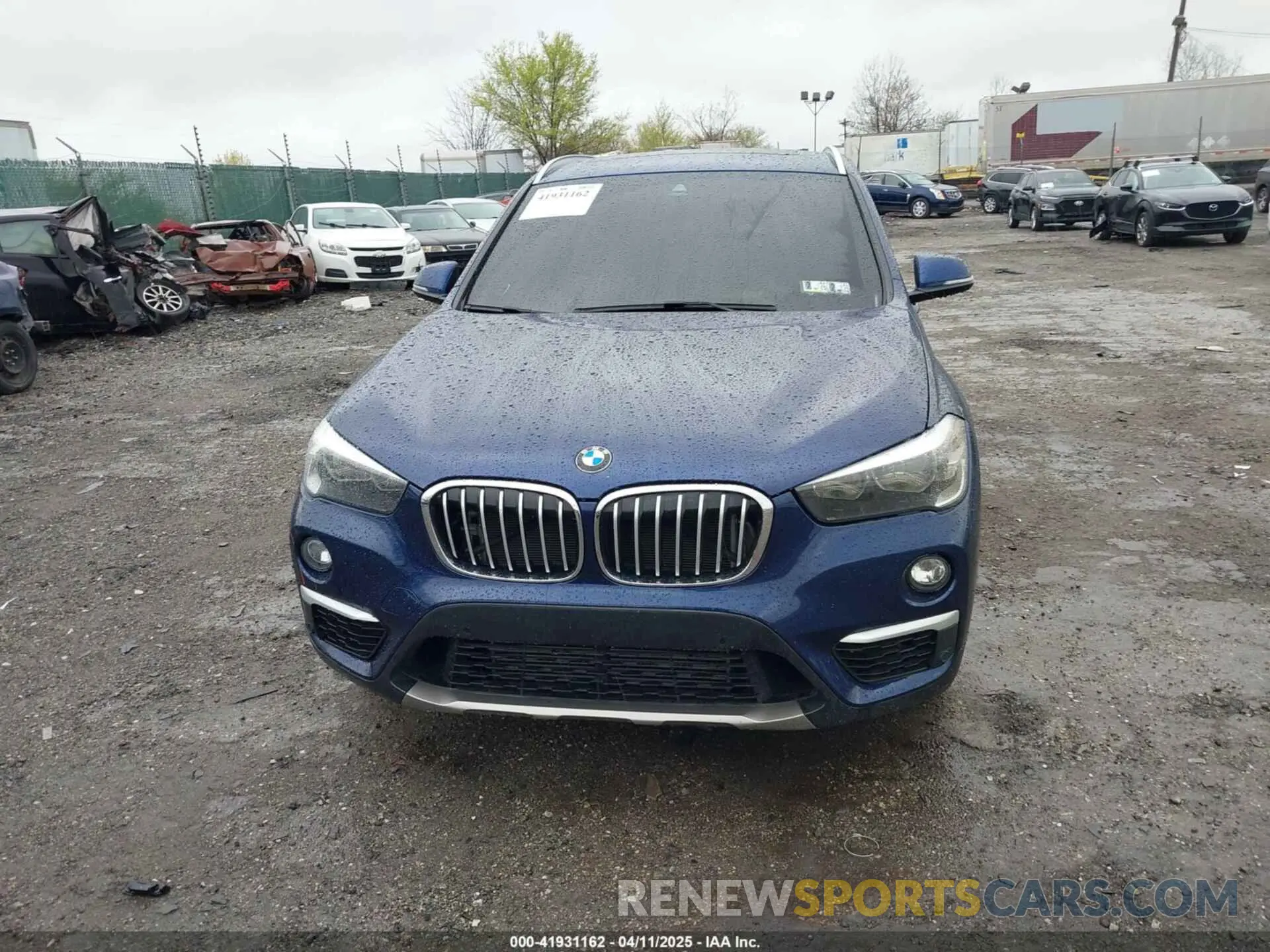 12 Photograph of a damaged car WBXHU7C5XK5L10933 BMW X1 2019