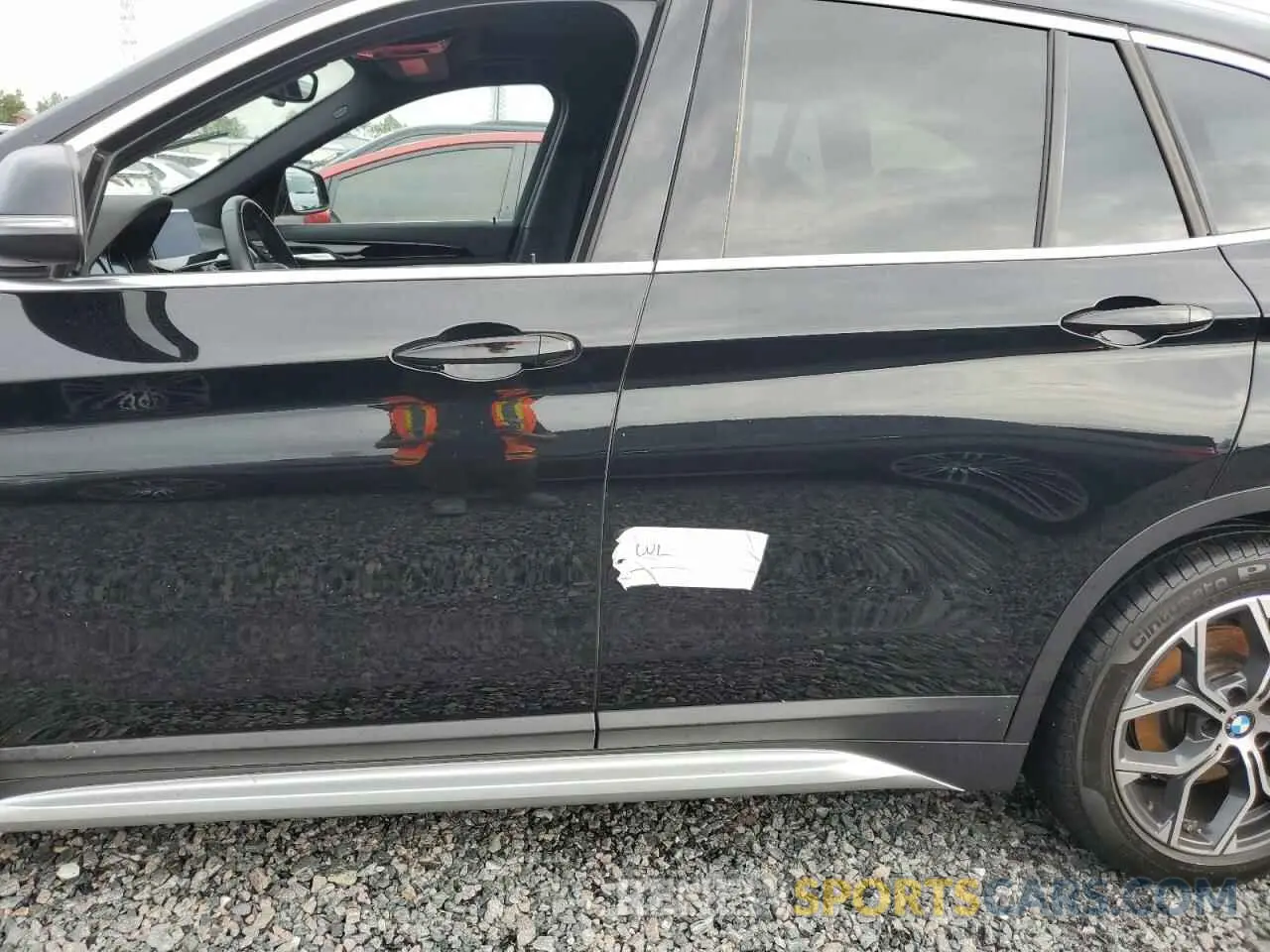 13 Photograph of a damaged car WBXJG7C00L5P46690 BMW X1 2020