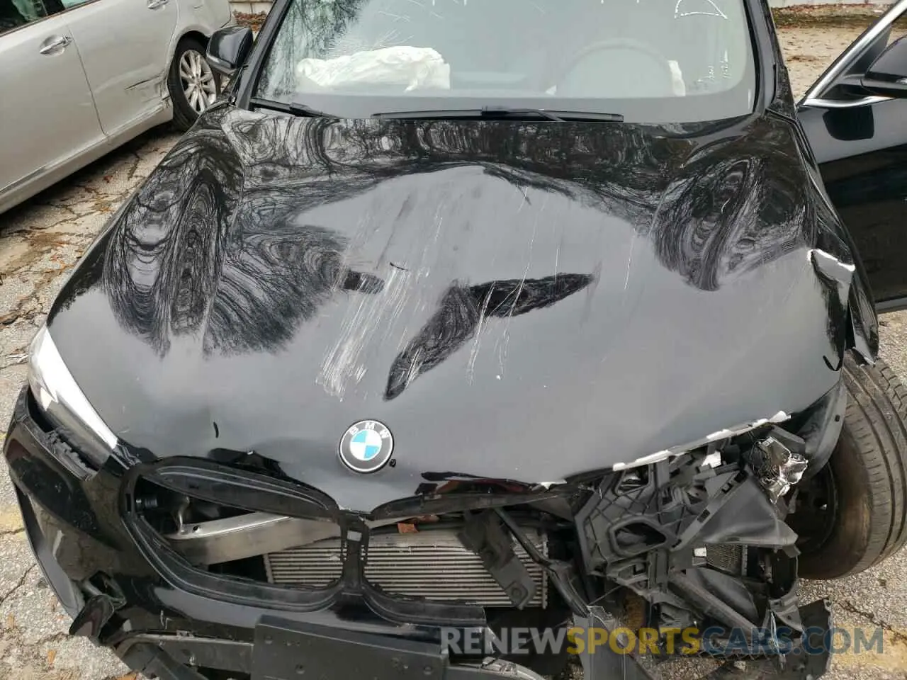 12 Photograph of a damaged car WBXJG7C01L3L86504 BMW X1 2020