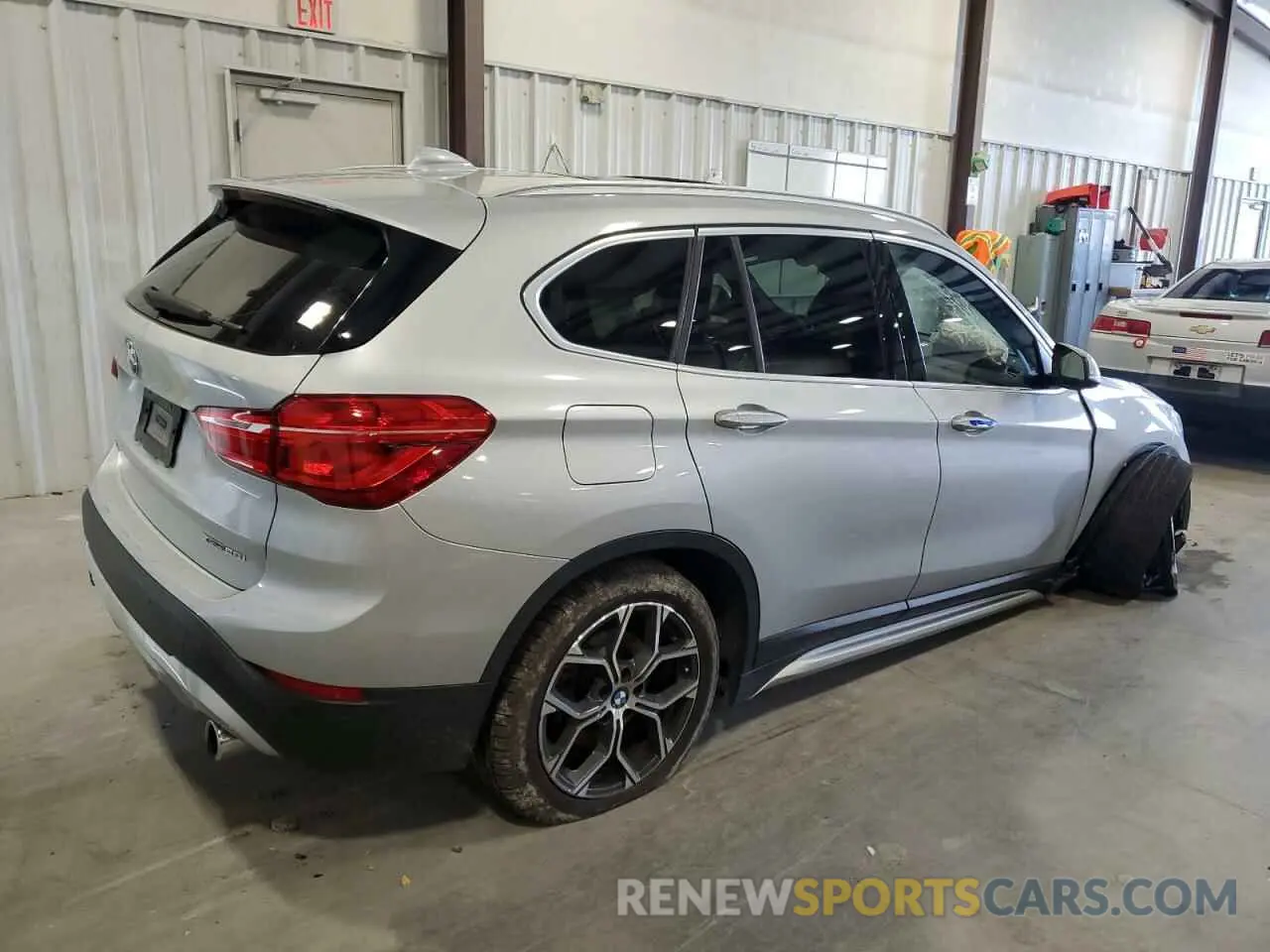 3 Photograph of a damaged car WBXJG9C06L5P94397 BMW X1 2020