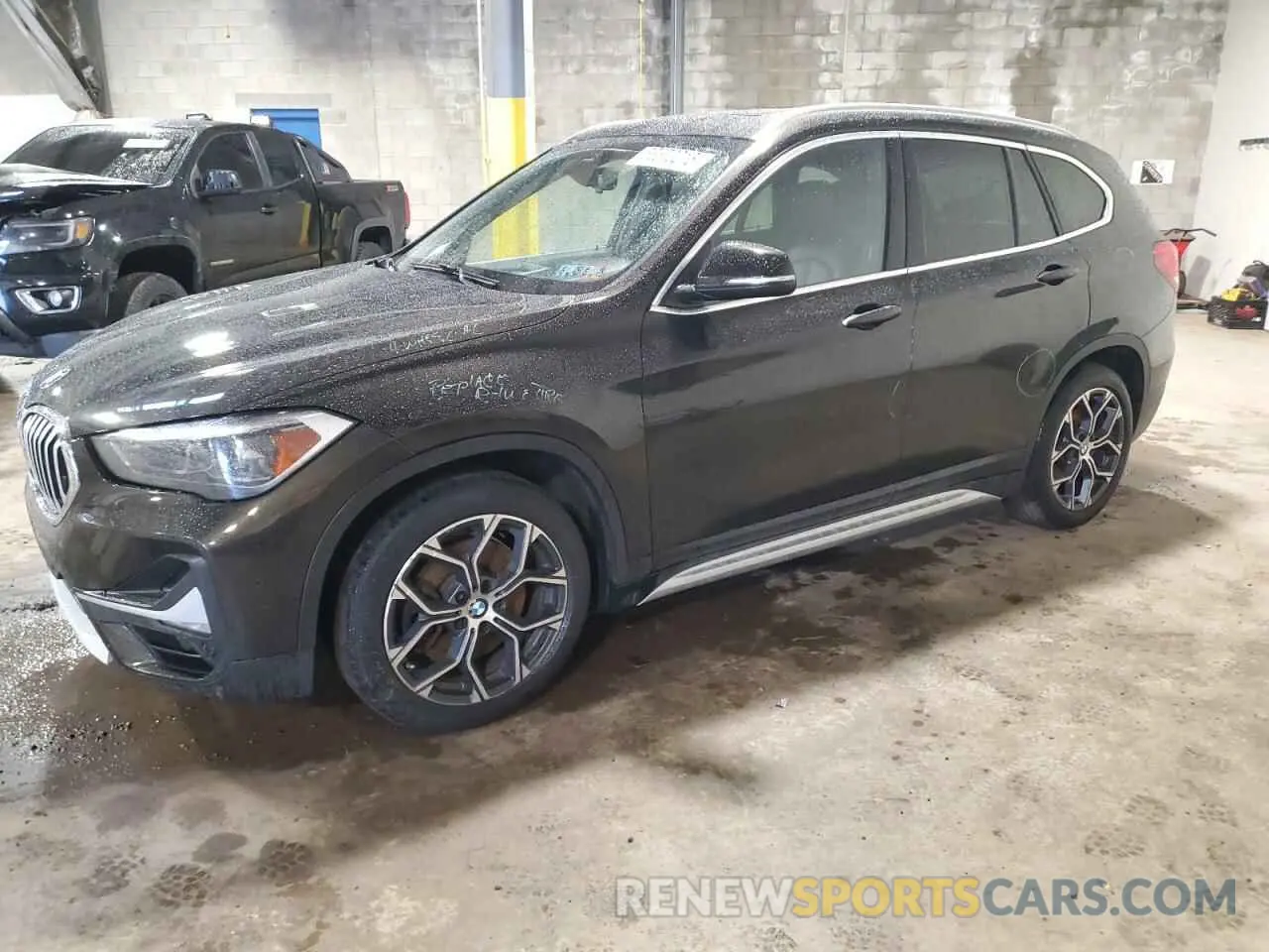 1 Photograph of a damaged car WBXJG9C09L5P27471 BMW X1 2020