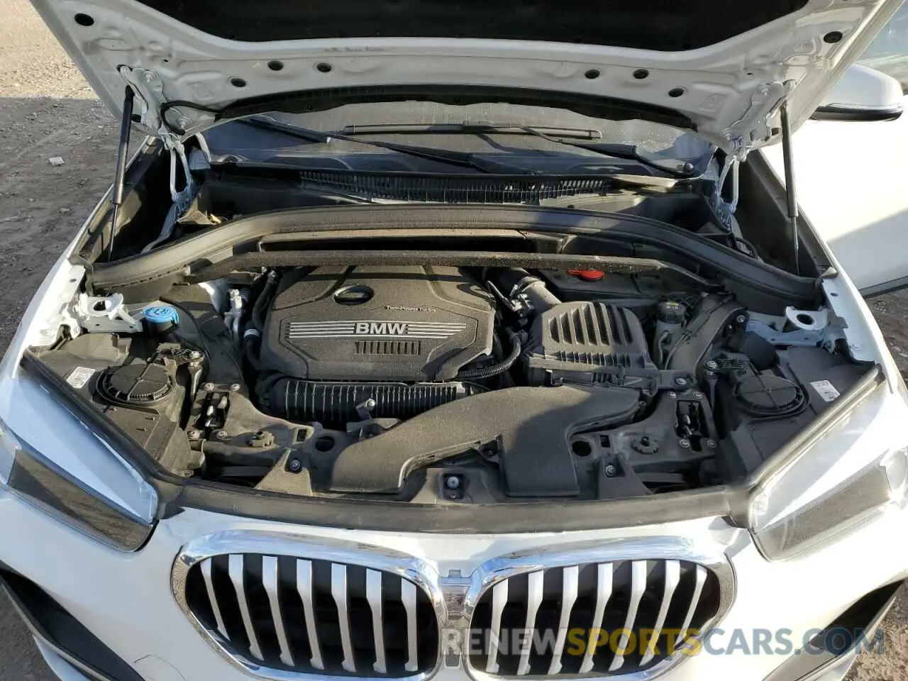 12 Photograph of a damaged car WBXJG9C0XL5P79773 BMW X1 2020