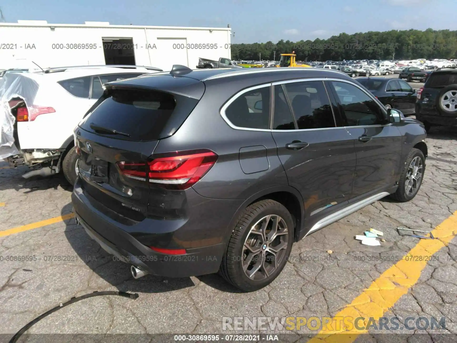 4 Photograph of a damaged car WBXJG7C03M5S68153 BMW X1 2021