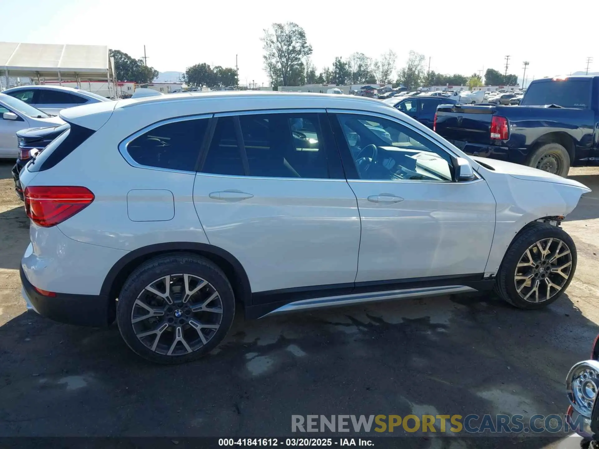 14 Photograph of a damaged car WBXJG7C08M5S34659 BMW X1 2021