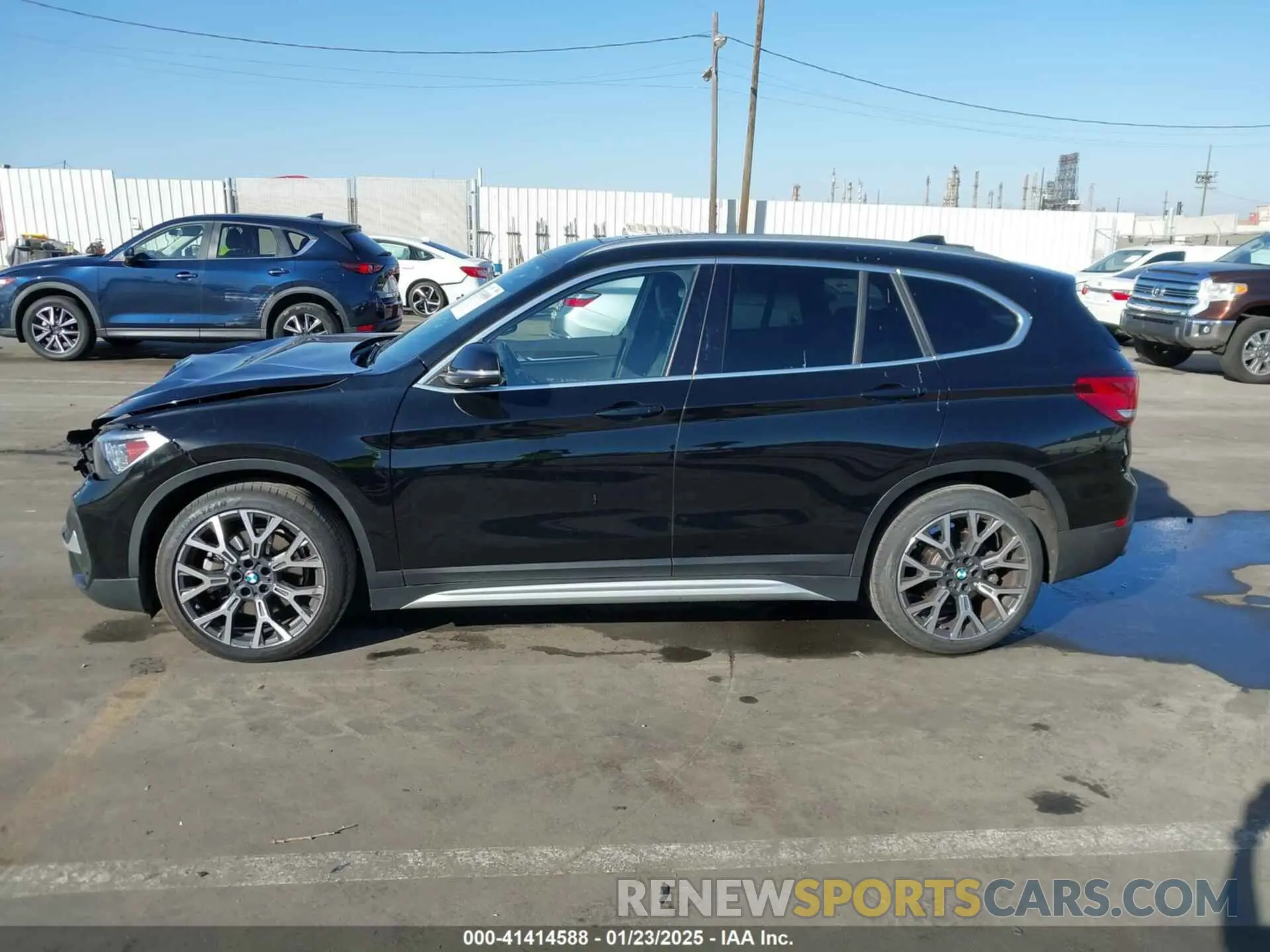 14 Photograph of a damaged car WBXJG7C09M5S34413 BMW X1 2021