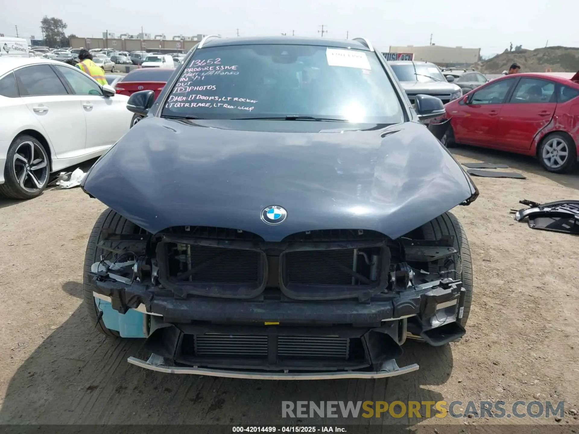 13 Photograph of a damaged car WBXJG7C0XM5T45715 BMW X1 2021