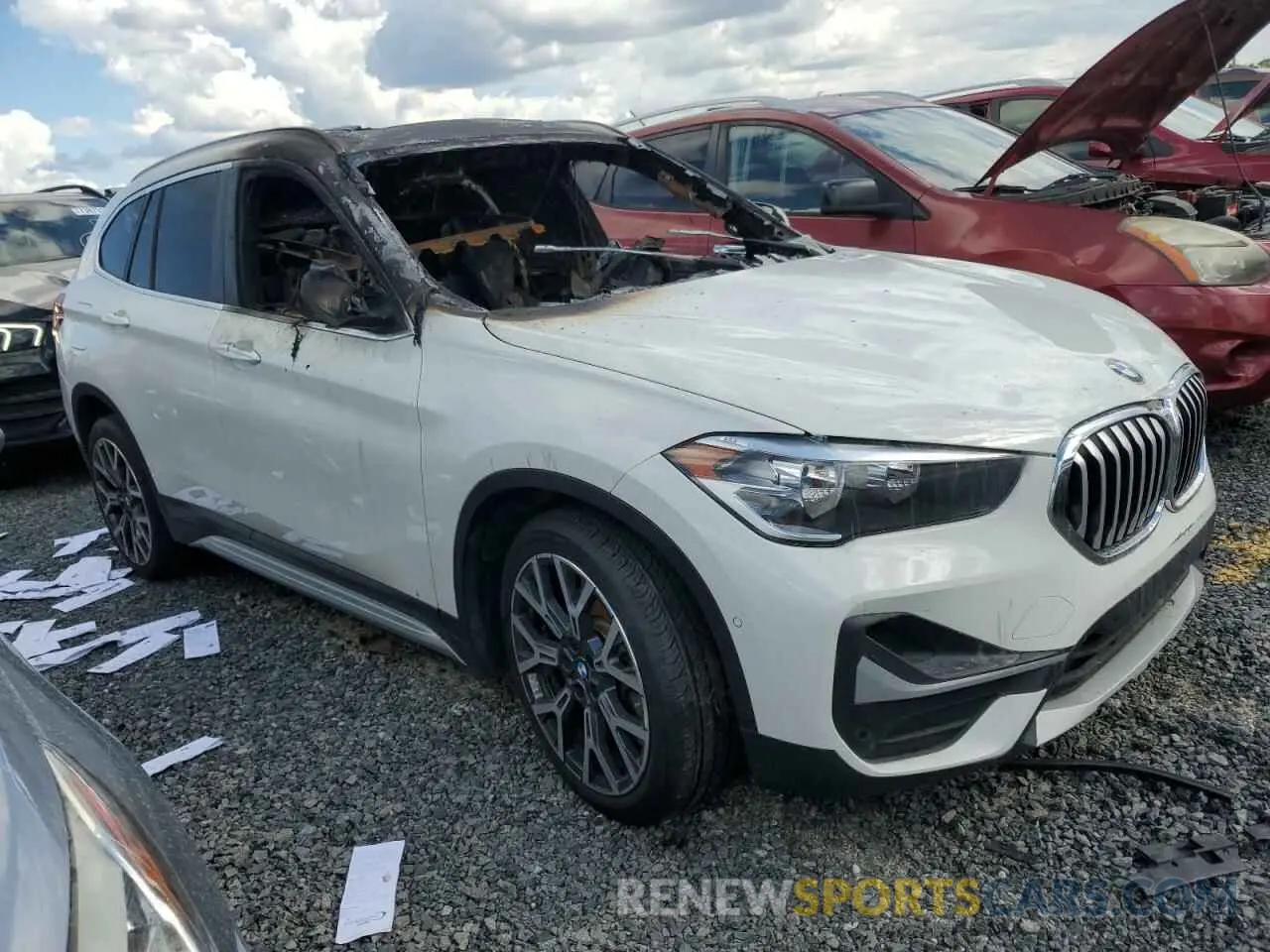 4 Photograph of a damaged car WBXJG7C0XM5U34877 BMW X1 2021